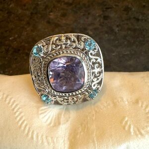 Amethyst and blue topaz sterling silver ring.